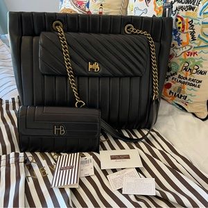 In great condition! Gorgeous Henri Bendel 712 Black Leather Tote and Wallet!